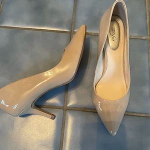 Bone color patent pumps